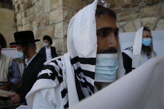 Ultra orthodox jewish men pray, Western Wall, Jerusalem October 2020