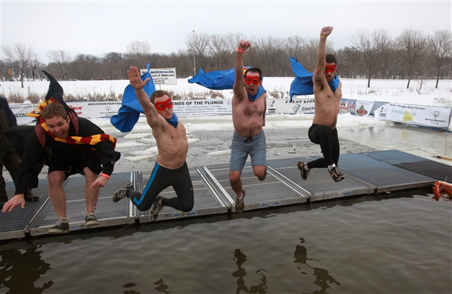 Plunging into the frozen Lake Madison, Wisconsin, February 2013